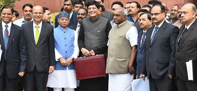 Interim budget skips the ‘T’ word, but industry gives a thumbs up